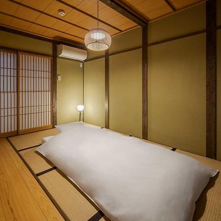 Villa Yoshimigura Machiya House à Kyoto Extérieur photo